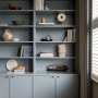 Between the Commons, SW11 | Bespoke bookshelves (blue) | Interior Designers